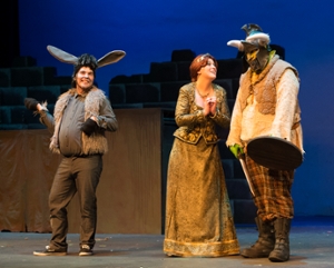 Fiona, played by Leah Milton, graces the stage with the donkey and Shrek.
