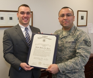 Michael Johnson and Sgt. Kevin Alvarado with the U.S. Air Force