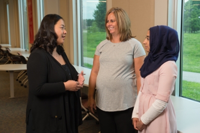 SIUE School of Pharmacy’s Dr. Jingyang Fan, Dr. Lisa Lubsch and student Sara Mohiuddin.