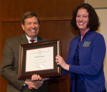 SIUE Interim Chancellor Stephen Hansen presents the Vaughnie Lindsay New Investigator Award to Dr. Sarah Luesse, assistant professor in the Department of Chemistry.