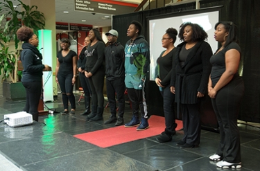 The SIUE Gospel Choir performs the Black National Anthem during the event.