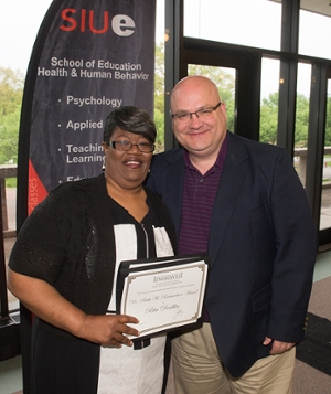 East St. Louis native Rita Doublin earned the Miriam C. Dusenbery Outstanding Student Award and the Dr. Ruth W. Richardson Award. She stands next to SIUE’s Dr. Stephen Marlette, associate professor in the Dept. of Teaching and Learning.