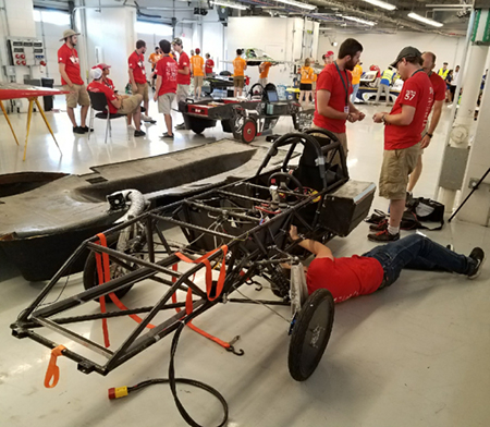SIUE Solar Car team members employed quick and critical thinking to make necessary modifications during the competition that enhanced their success. 