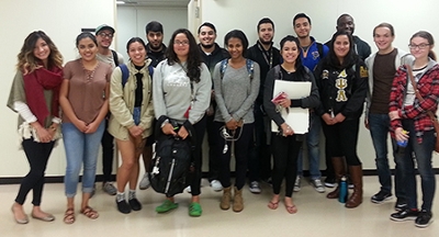 Sixteen Southern Illinois University Edwardsville undergraduates studying Spanish for Heritage Speakers engaged in service learning throughout Hispanic Heritage Month at Fairmont City Public Library.