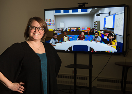Standing in SIUE's virtual learning environment is Anni Reinking, EdD, assistant professor in the School of Education, Health and Human Behavior's Department of Teaching and Learning.