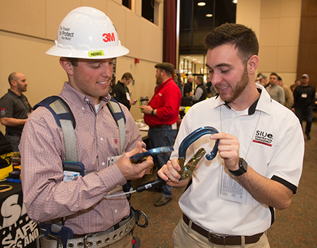 SIUE senior construction management majors and members of the School of Engineering's Constructor's Club (L-R) Drew Westerhold and Cody Kruse check out safety equipment during the SIOSH/SafetyCon event held at SIUE.