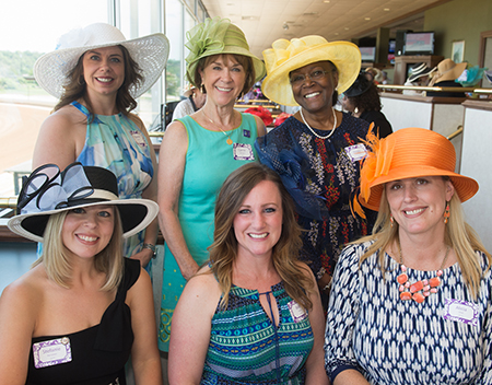 A group of SIUE Meridian Derby attendees smile in their colorful array of hats. (Back L-R) Karen Sroka, Carrie Babington, Peggy Underwood, (Front L-R) Stefanie Perryman, Beth Pense and Alicia Litrak.