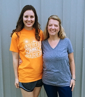 Standing together are SIUE elementary education graduate Amanda Loker and her high school math teacher Mrs. Mays.