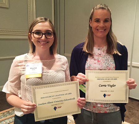 SIUE SSHP chapter president Kaylee Poole stands alongside Dr. Carrie Vogler during the ICHP annual meeting in Chicago. Poole accepted the 2018 Student Chapter Award and Vogler was presented the Shining Star Award.