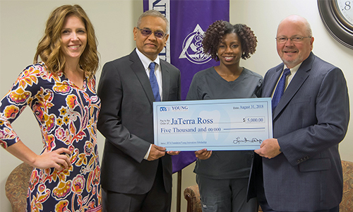 (L-R) SIU SDM Director of Community Dentistry Dr. Katie Kosten; Director of Operations with Young Dental Rajul Amin, representing the Dental Trades Alliance Foundation; scholarship recipient Jaterra Castine-Ross; and SIU SDM Dean Dr. Bruce Rotter.