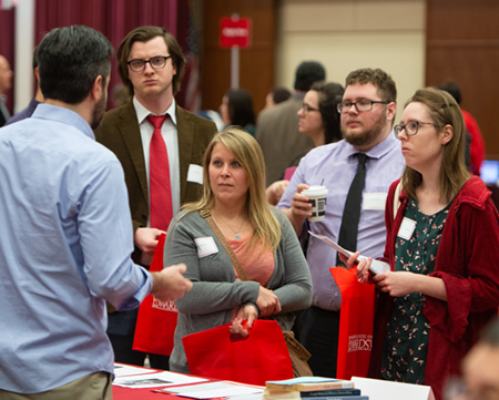Dylan Anderson, Ami Murphy, David Thompson, and Autumn Haas listened intently to a history graduate program representative at the SIUE Graduate School Open House.