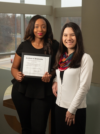 SIUE senior Tiffany Williams (left) was nominated for the ISOPHE Student Scholarship by her faculty mentor, Alice Ma, PhD.