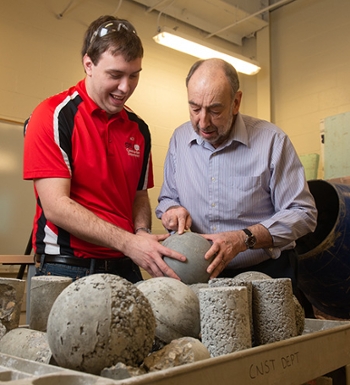 SIUE professor emeritus Luke Snell, PE, offers his concrete expertise to senior construction management major and SIUE ACI Student Chapter vice president David Rall.
