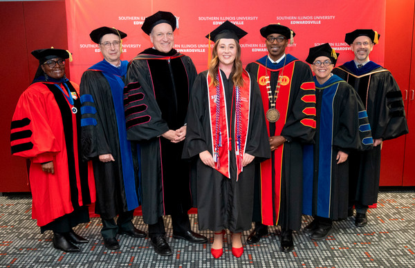 Student speaker with Dr Mahony Dr Minor Provost Cobb and Deans