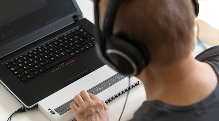Student working at a computer.
