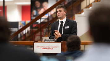SIUE Student speaks at a podium.