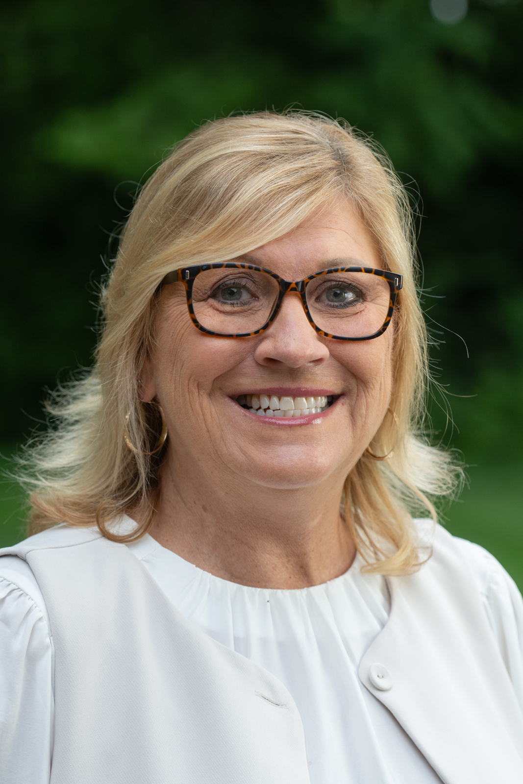 A portrait photo of Ann Frank