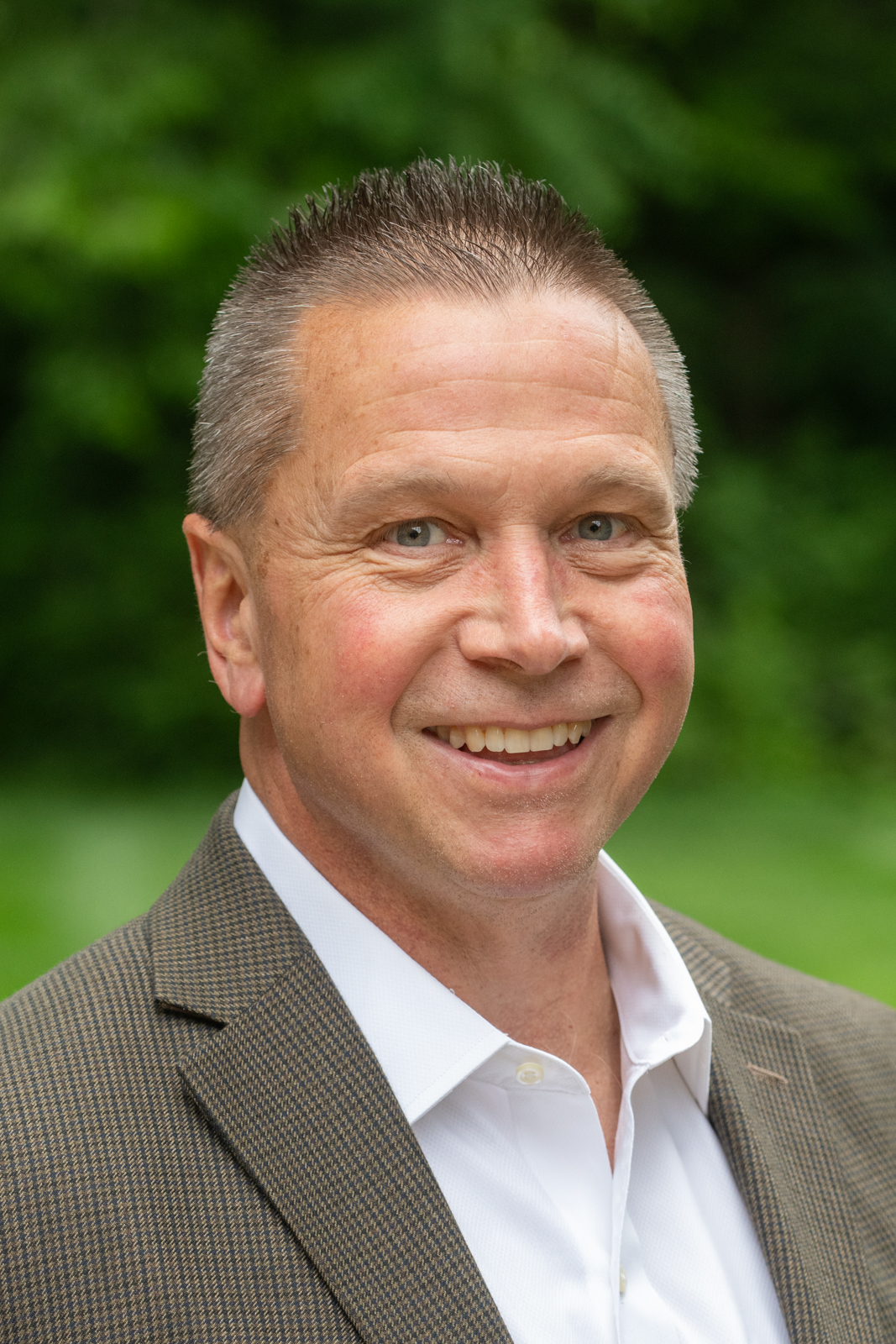 A portrait photo of Charlie Reifsteck