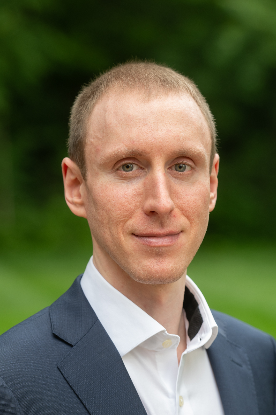 A portrait photo of John Siampos