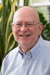 A portrait photo of Dr. Tom Fowler