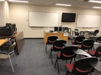 Picture of room with chairs and whiteboard