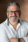 A portrait photo of Steve Tamari