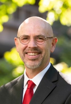 A portrait photo of Kevin Leonard, PhD