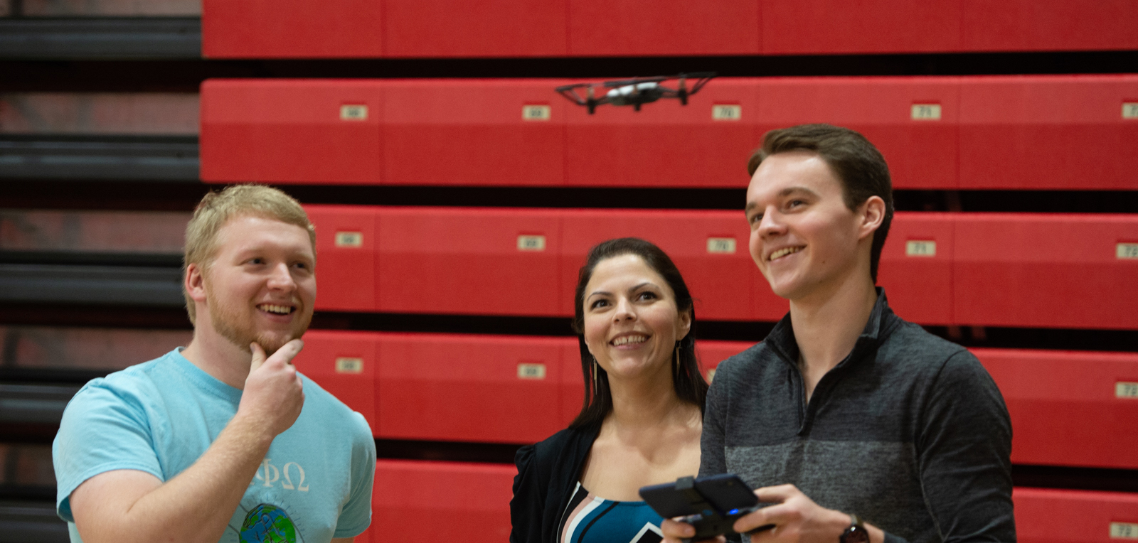 Martinez and students with drone