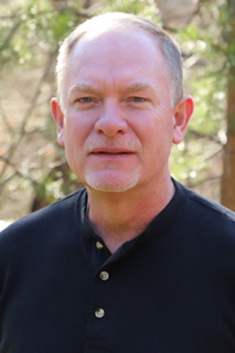 A portrait photo of Randy Mueller