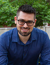A portrait photo of Christopher Holland