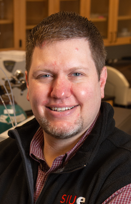 A portrait photo of Kevin Tucker (Faculty Senate BFAOC Representative)