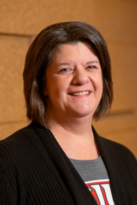 A portrait photo of Kristin Cruz