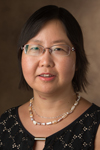 A portrait photo of Huaibo Xin, DrPH, MD, MPH