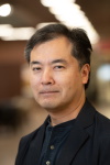 A portrait photo of Dr. Mitsuru Shimizu