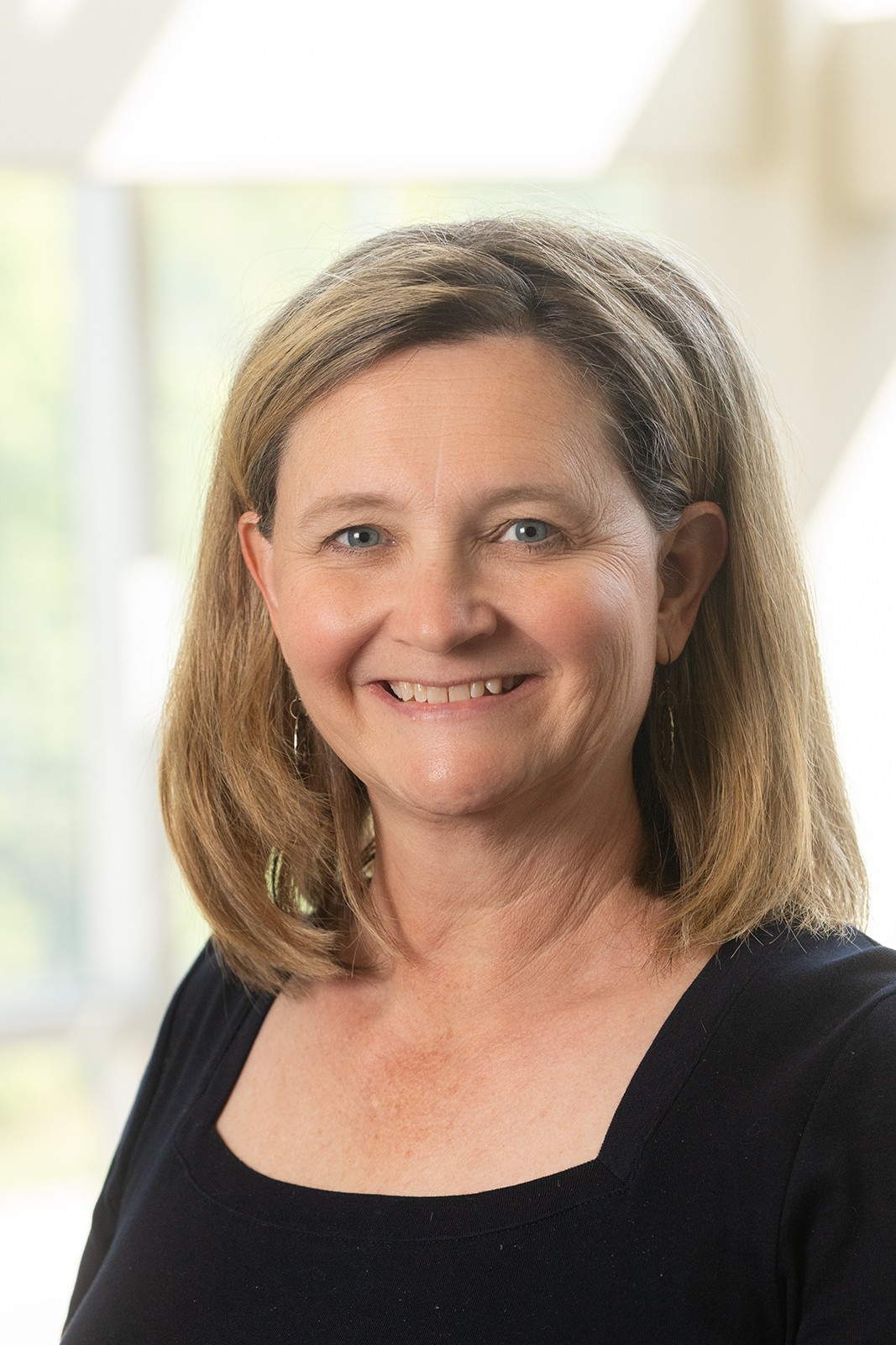 A portrait photo of Cynthia Hollmann M.S. CCC-SLP