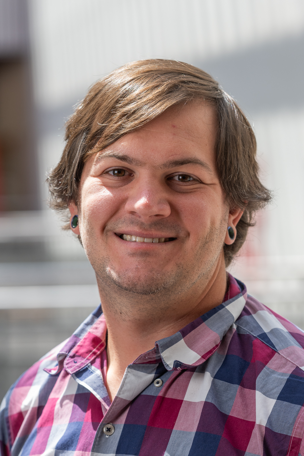 A portrait photo of Johnny Bresett, PhD