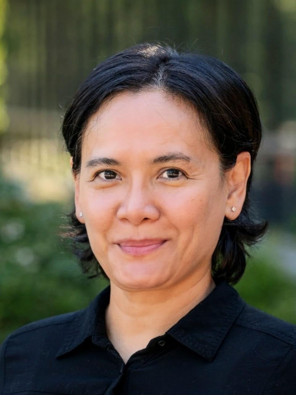 A portrait photo of Michelle Carroll