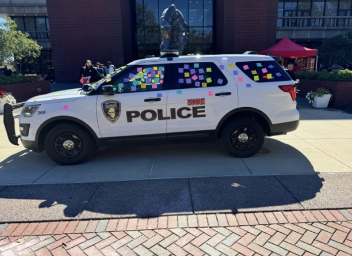 SIUE PD cruiser covered with post its