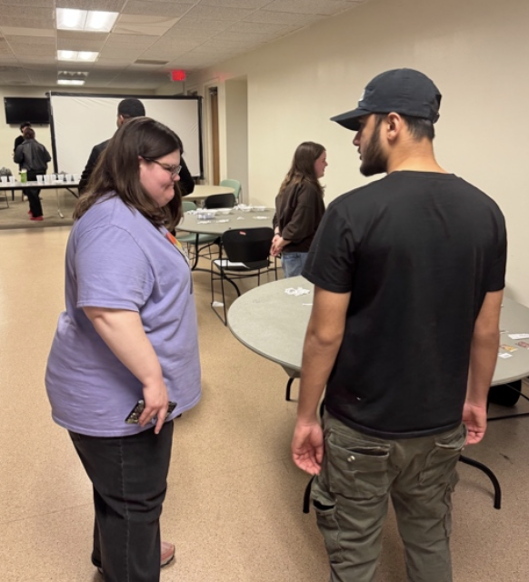 students play minute to win it games with EOA practicum students