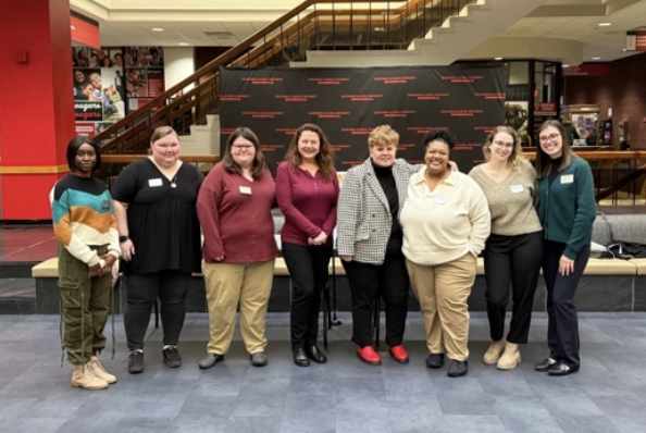 EOA director, outreach and prevention coordinator, and MSW and BSW practicum students in the EOA office