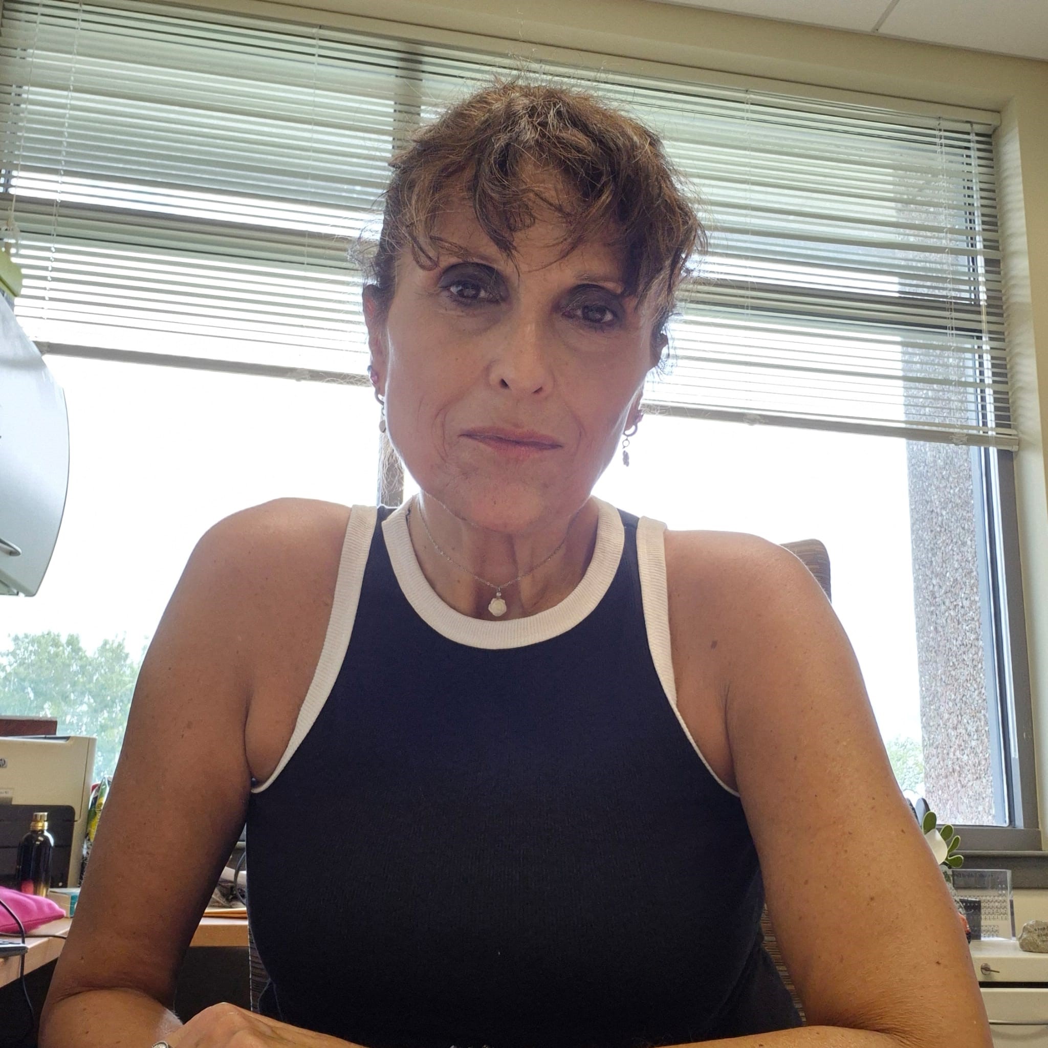 A portrait photo of Dr. Cristina De Meo