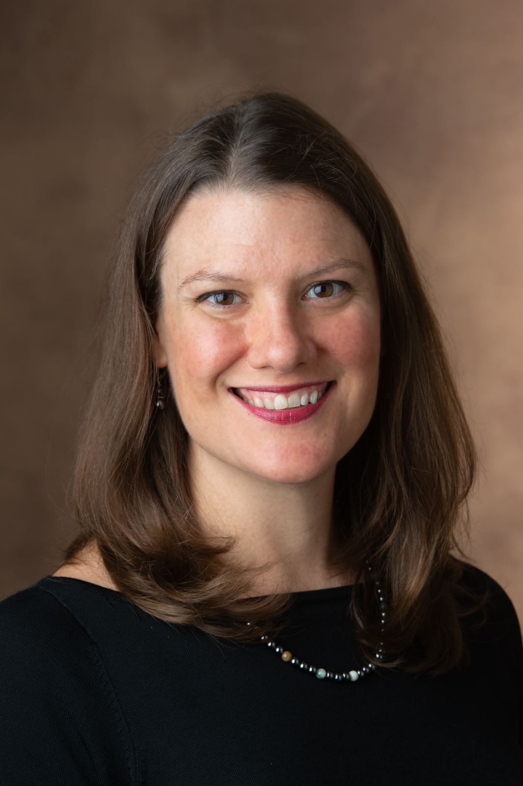 A portrait photo of Dr. Jennifer Miller