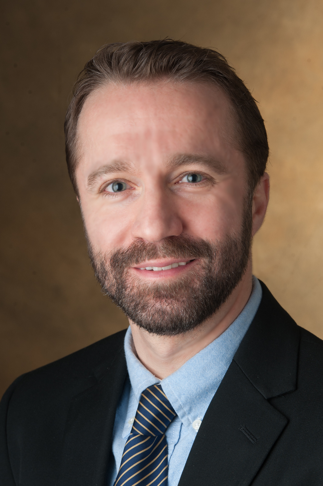 A portrait photo of Dr. Serdar Celik