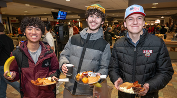 SIUE student eating at Centre Court in the Morris University Center.