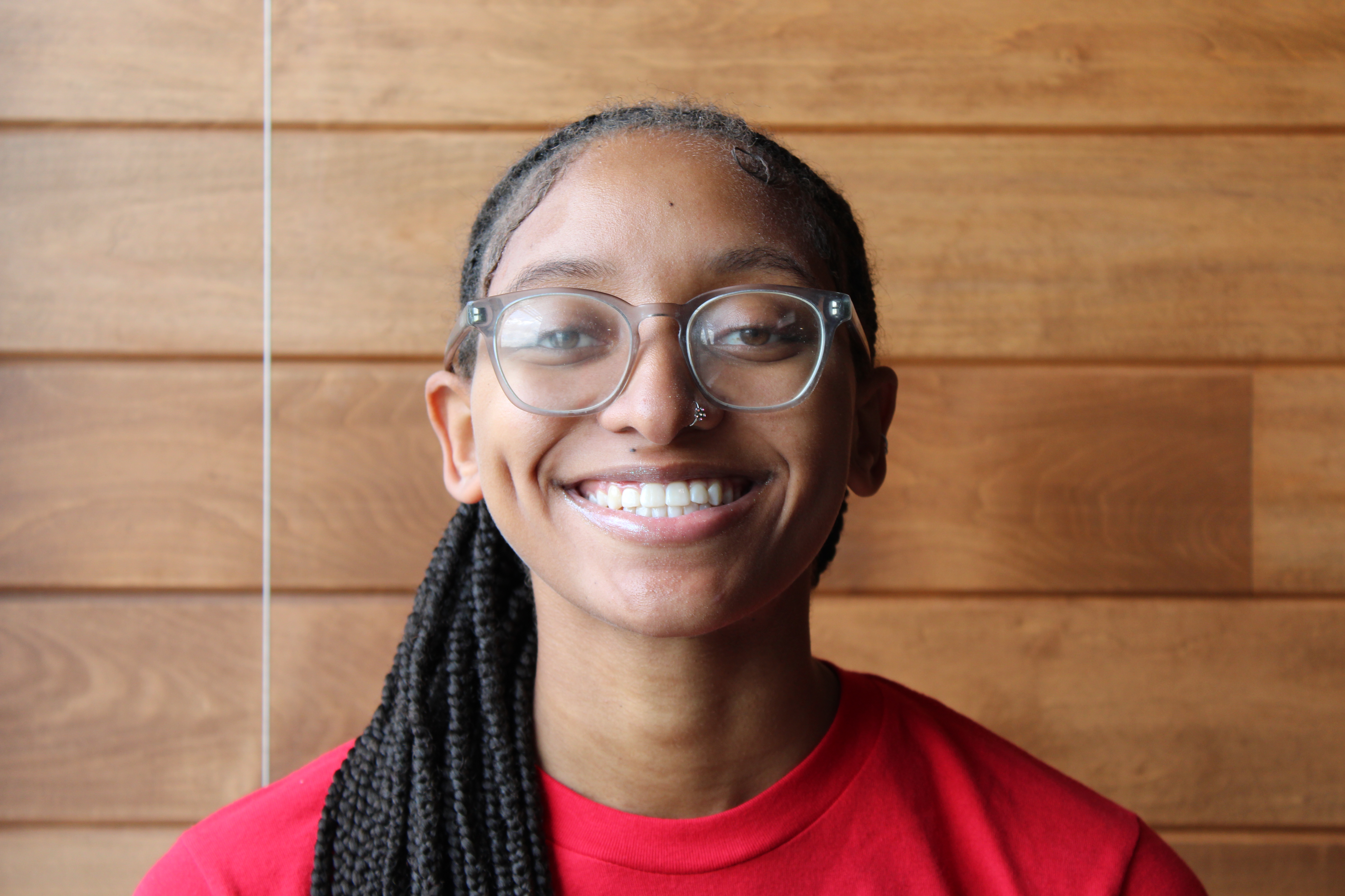 A portrait photo of Aseanti Boone