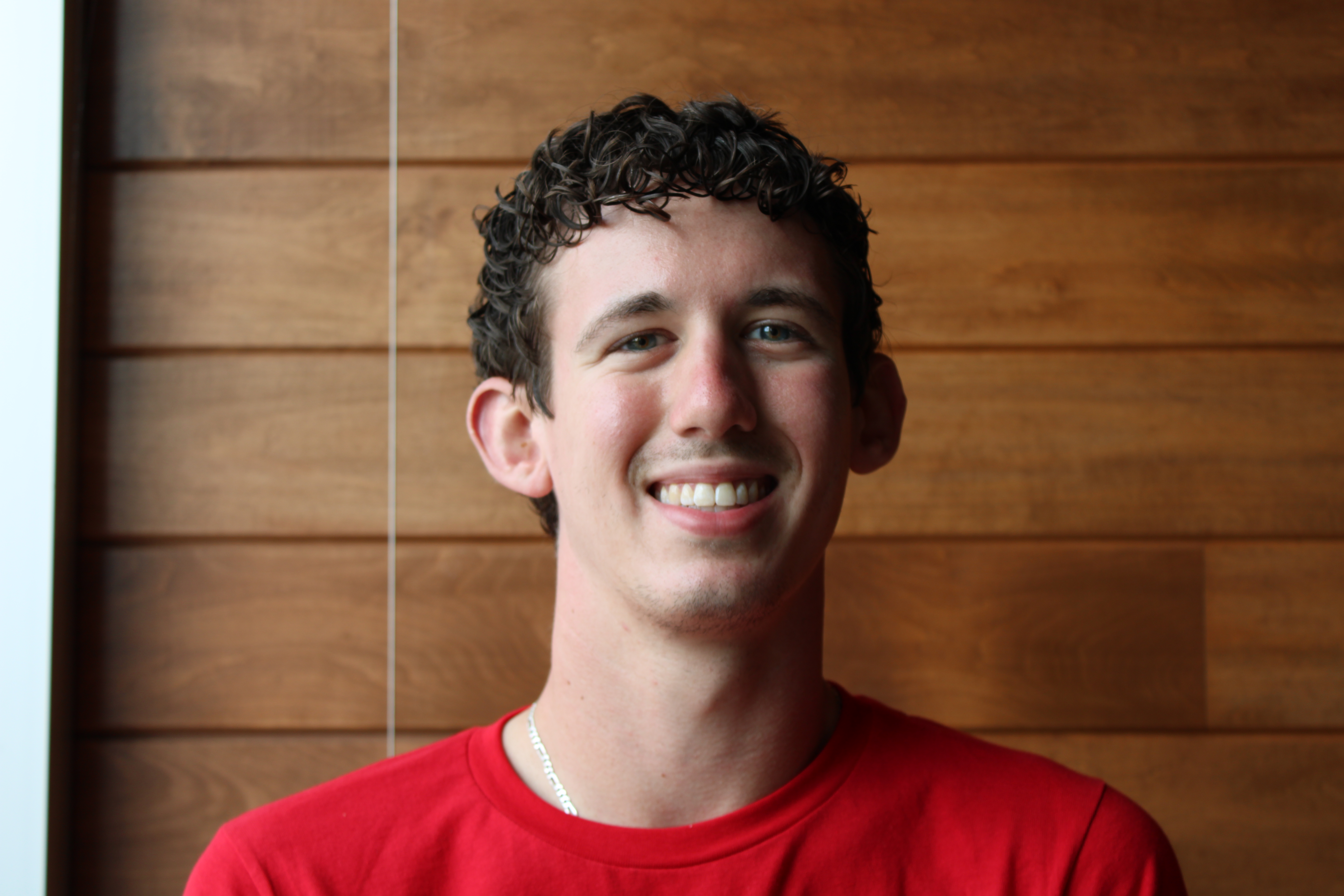 A portrait photo of Brandon Dennison