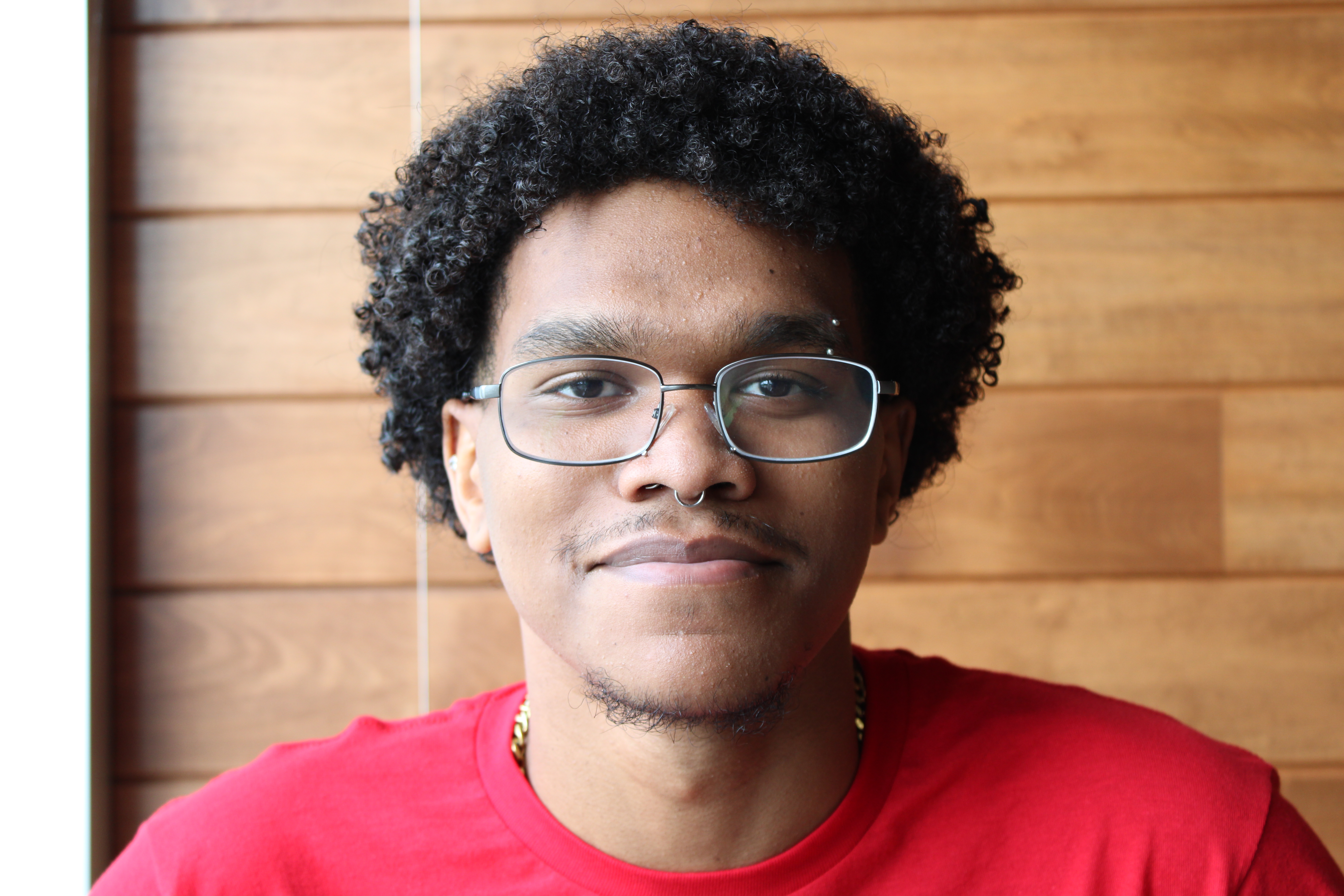 A portrait photo of Manny Rosario-Frias