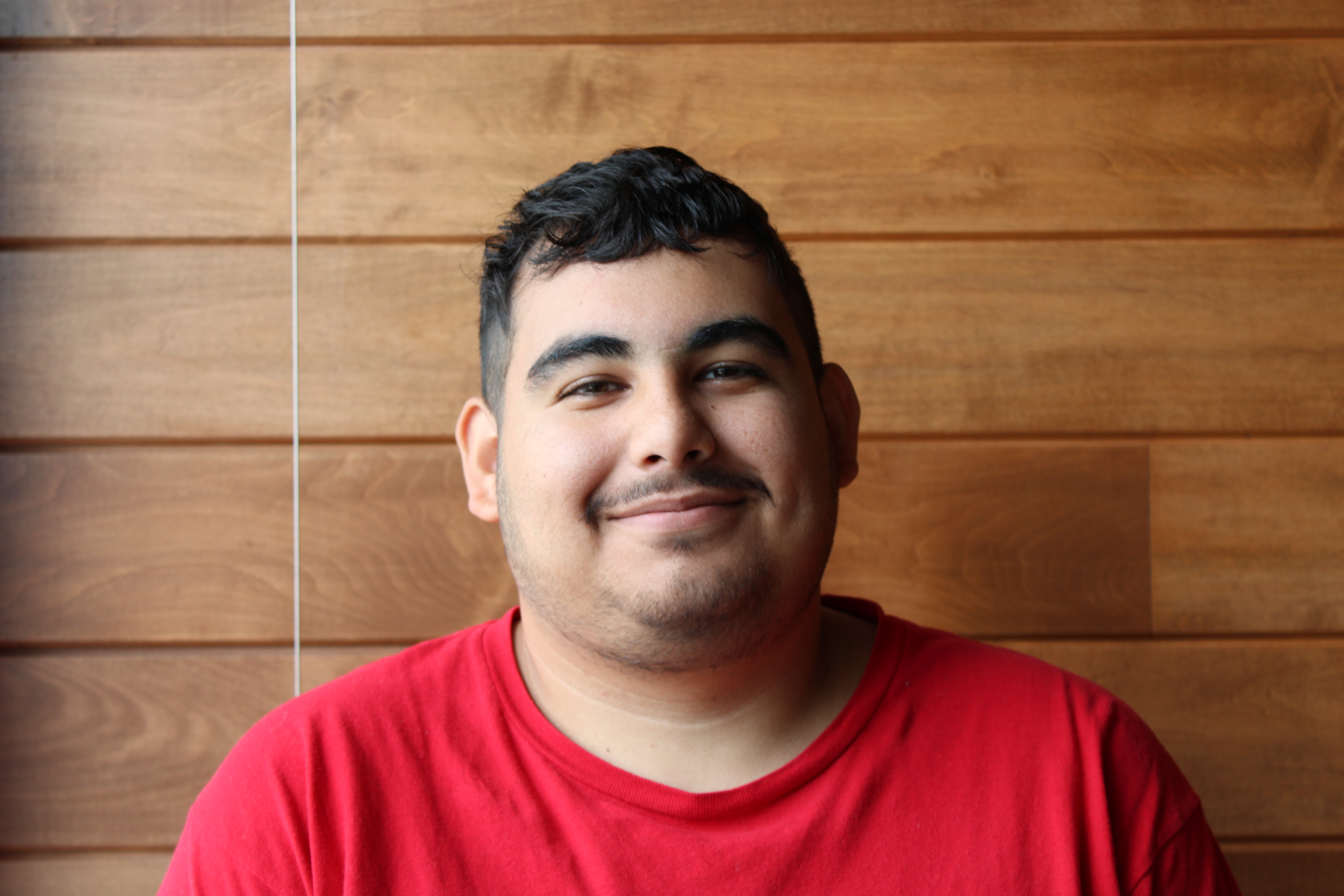 A portrait photo of Marcos Gomez