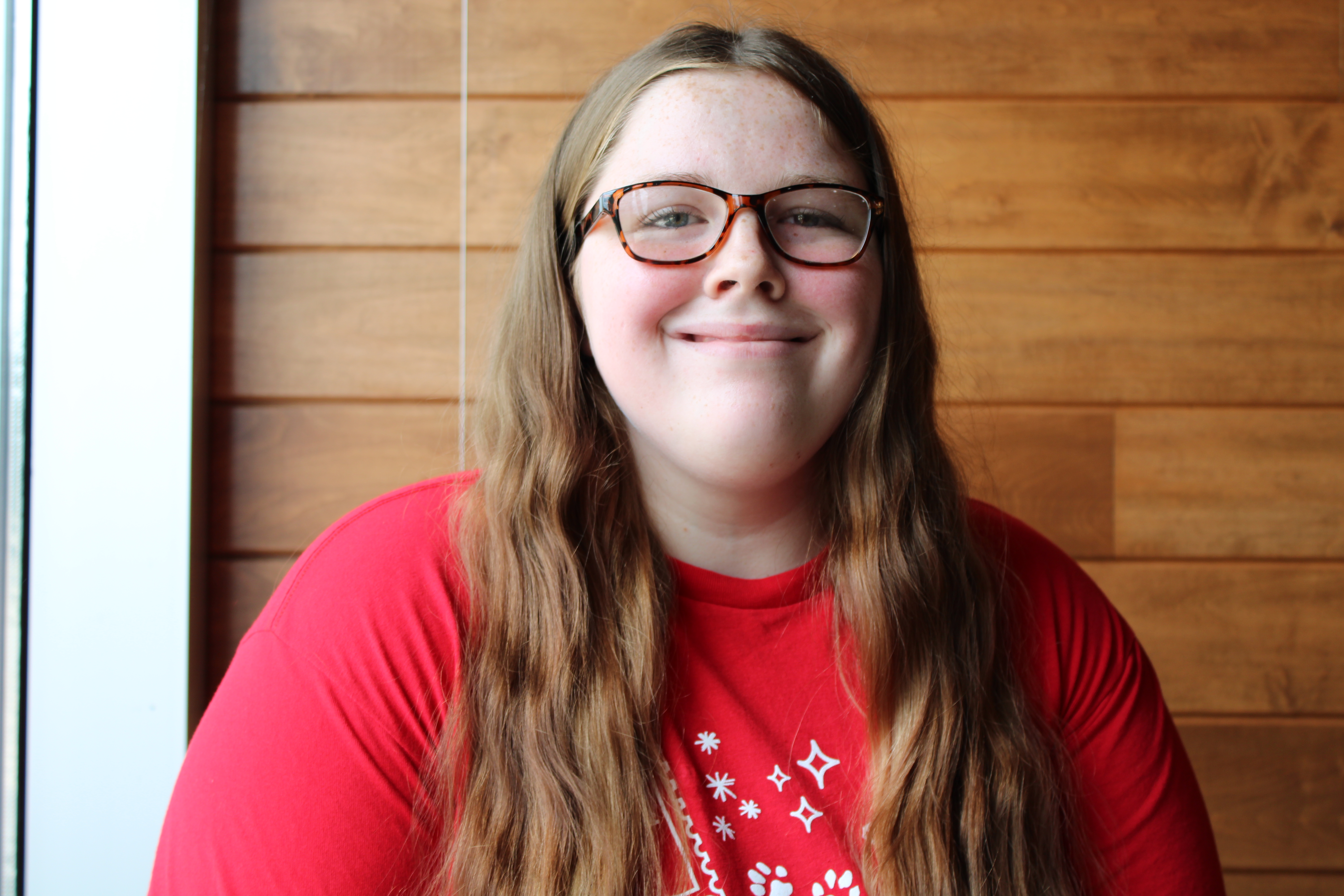 A portrait photo of Megan Roseman