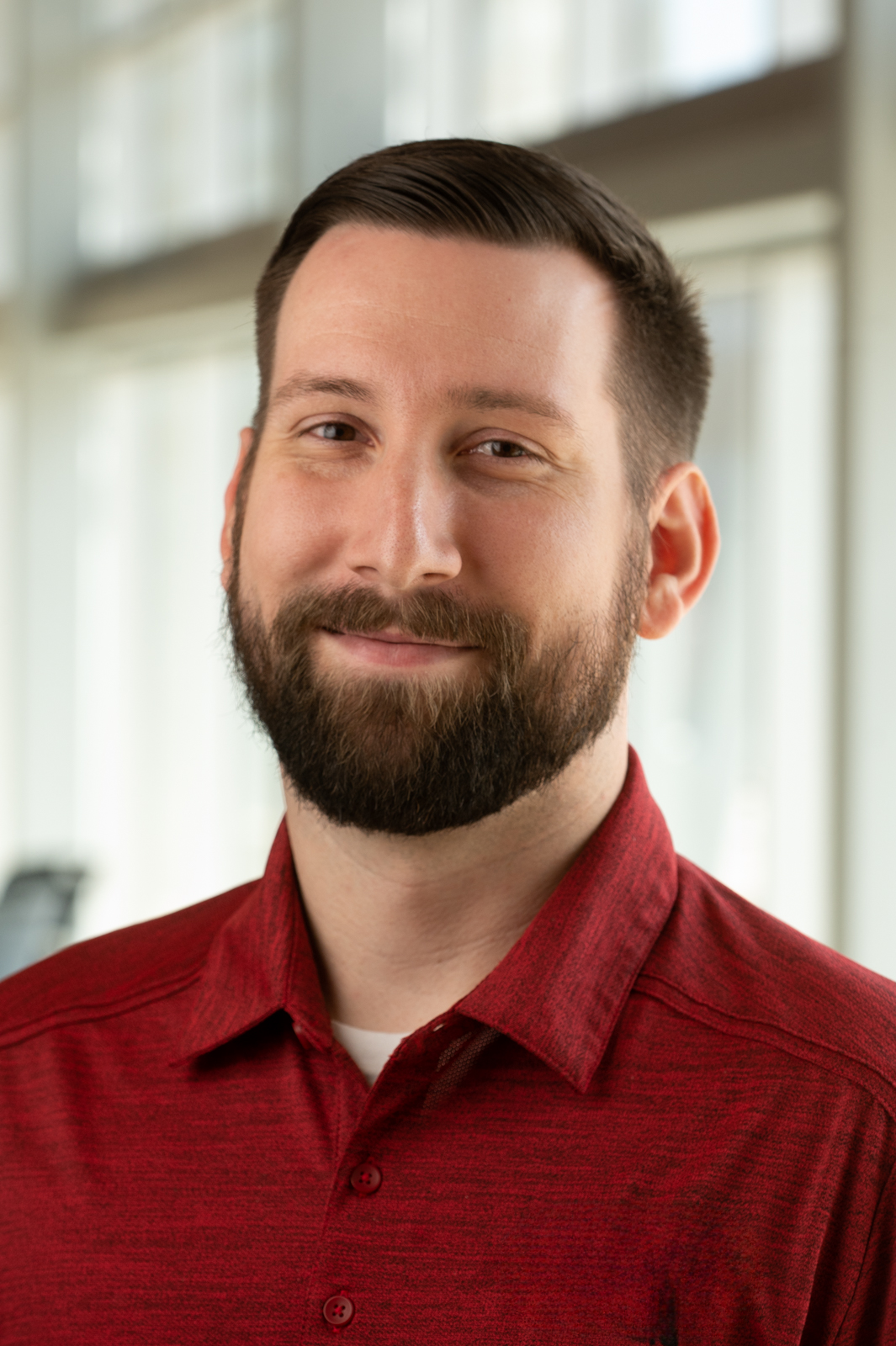 A portrait photo of Brandon Perjak